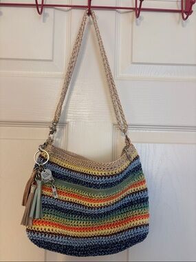 The Sak Multicolor Striped Handwoven Adjustable Strap Bag with Tassel Charms